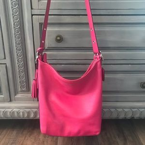 Coach legacy bucket bag with tassel